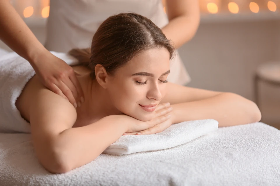 Woman receiving a relaxing spa massage