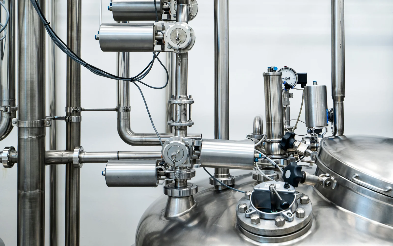 Stainless-steel industrial process equipment, pipes and instrumentation