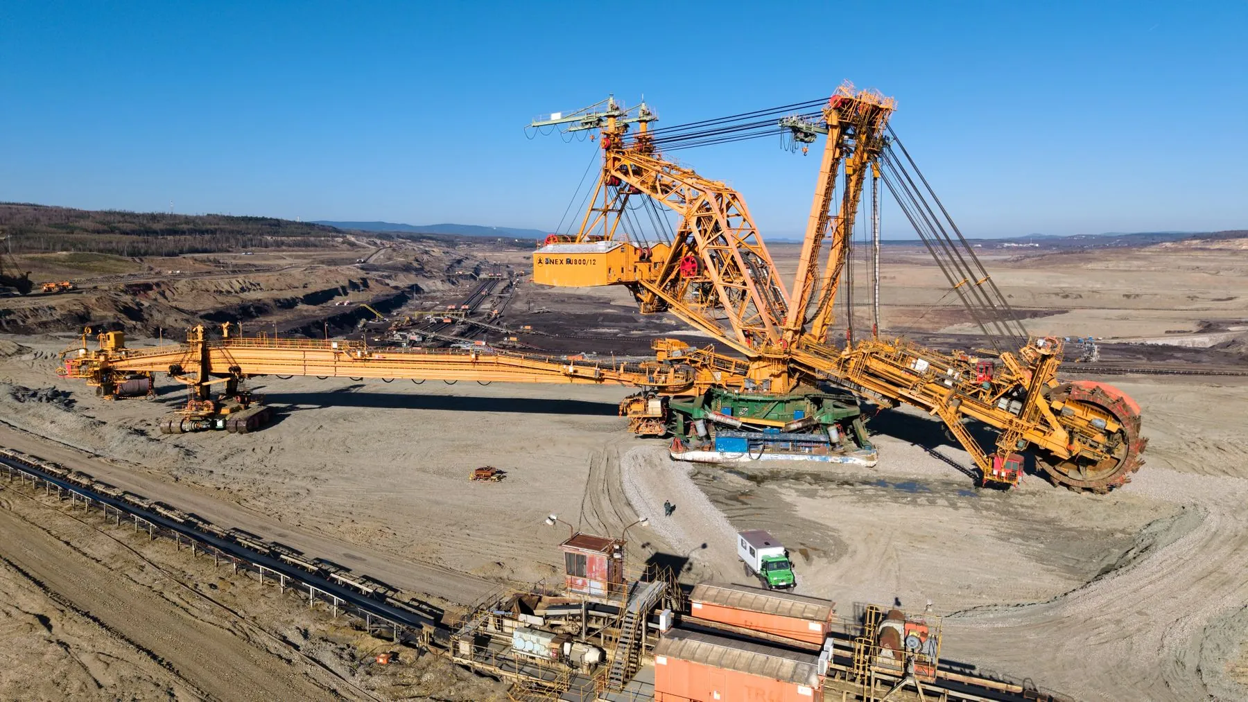 Large-scale extraction equipment operating in an open-pit mine