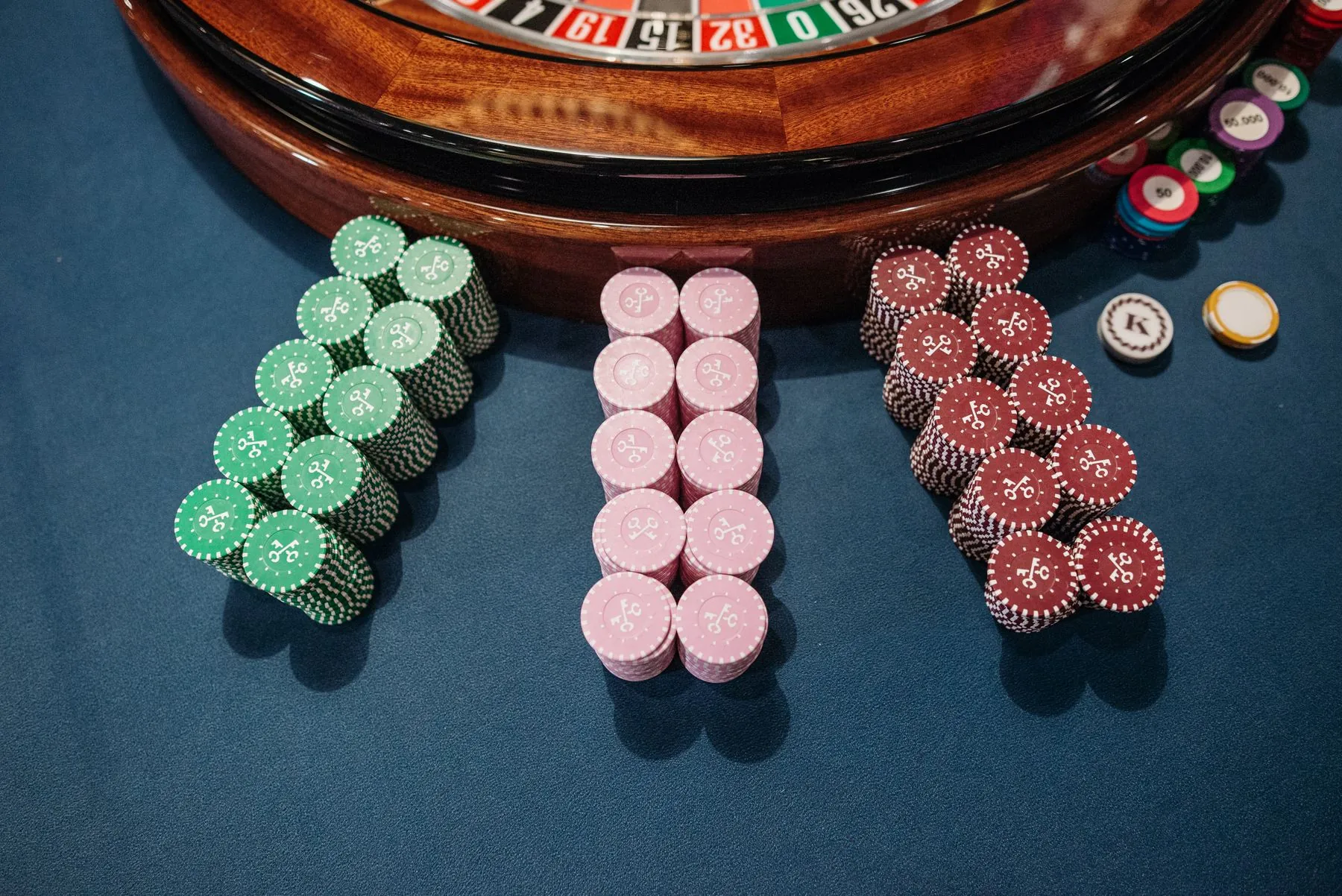 Roulette and gaming chips in a regulated casino environment